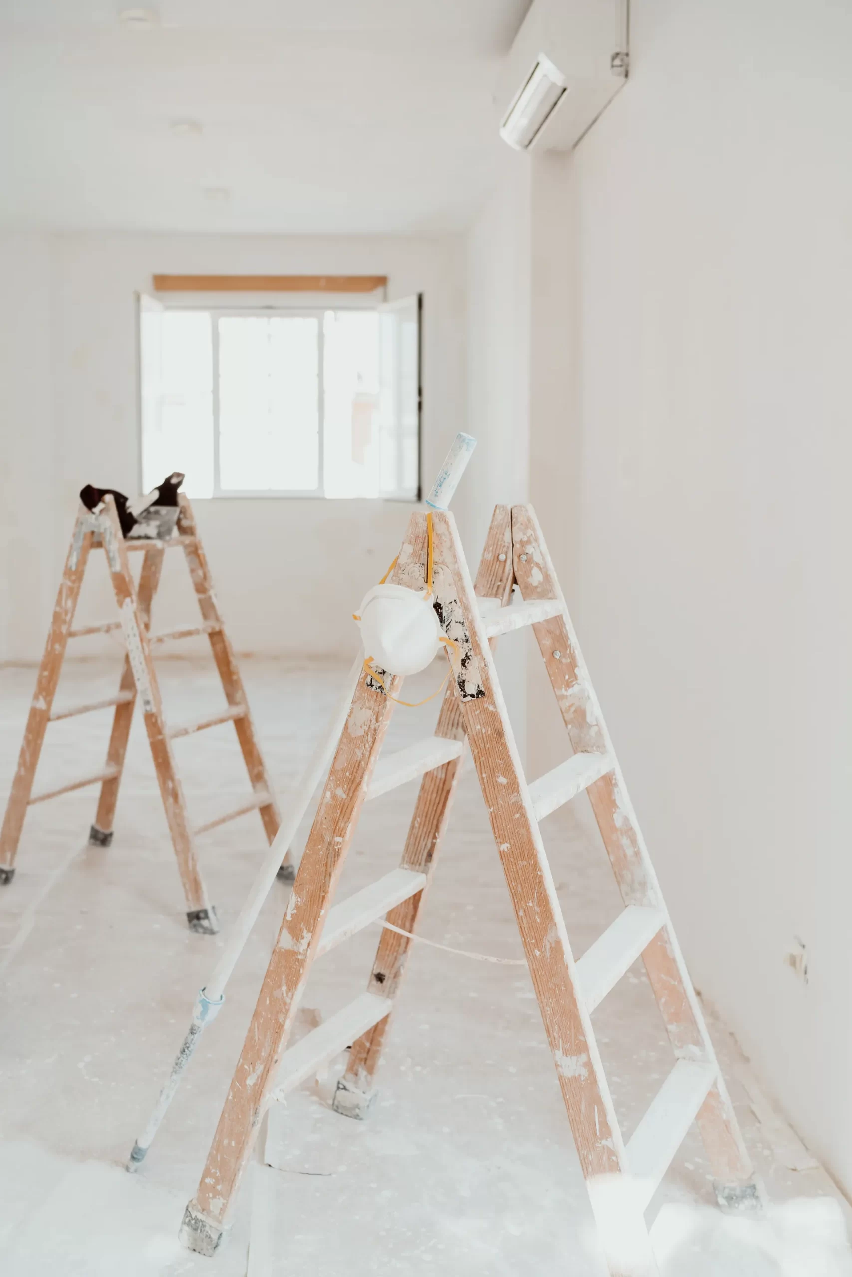 ladders-white-room-construction-site-painting-walls-home-improvement-renovation-scaled.webp